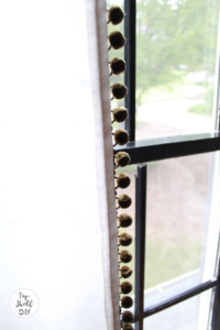 Get these adorable farmhouse curtains by adding pom pom trim to Ikea sheers! A $30 project. #ikeahack #farmhousecurtains