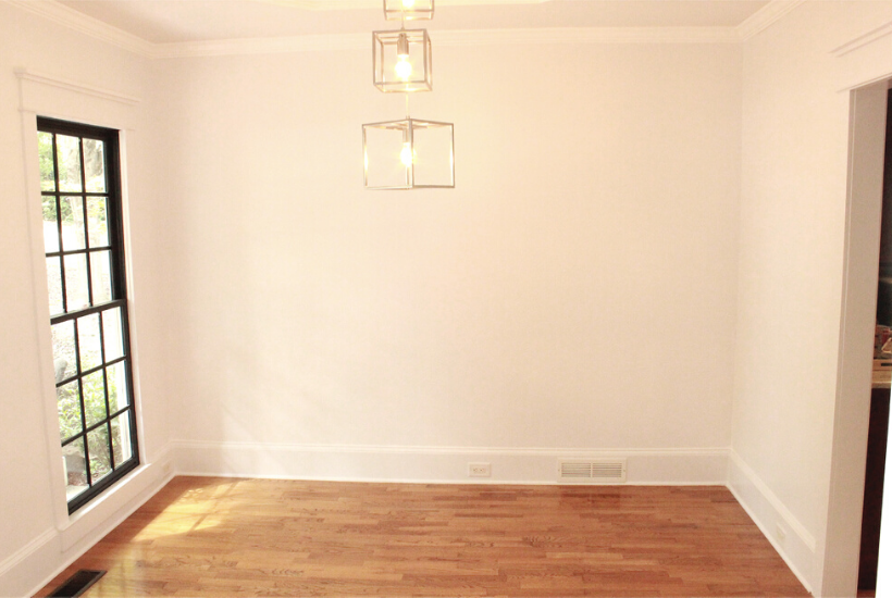 How I gave our dining room a fresh look with lighter paint and the removal of 90s wainscoting.