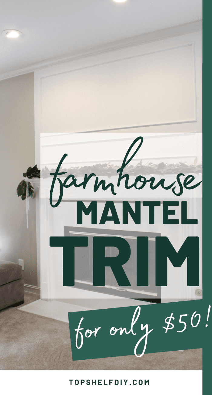 Gorgeous fireplace with DIY magnolia garland. Here's how to update the space above the mantel with trim and white paint. #fireplacedecor #manteldecor #Marblefireplace
#Fireplacemakeover #Fireplacedesign #Modernfireplace #Seasonalmanteldécor