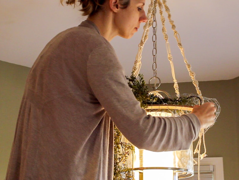 Christmas Craft Material Challenge Week 2: Macrame. Learn how to make this DIY Macrame Chandelier using very simple knots to transform your existing light fixtures. #holidaylighting #macramediy #macramechandelier