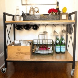 Learn how to make a fabulous DIY bar cart from aluminum tubing for your home bar!