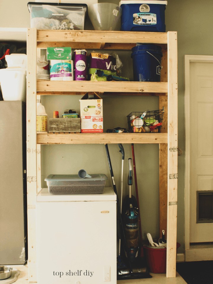 Easy garage shelving from 2x4s as part of my garage renovation series! Get the free plans today and have them up in a few hours.  