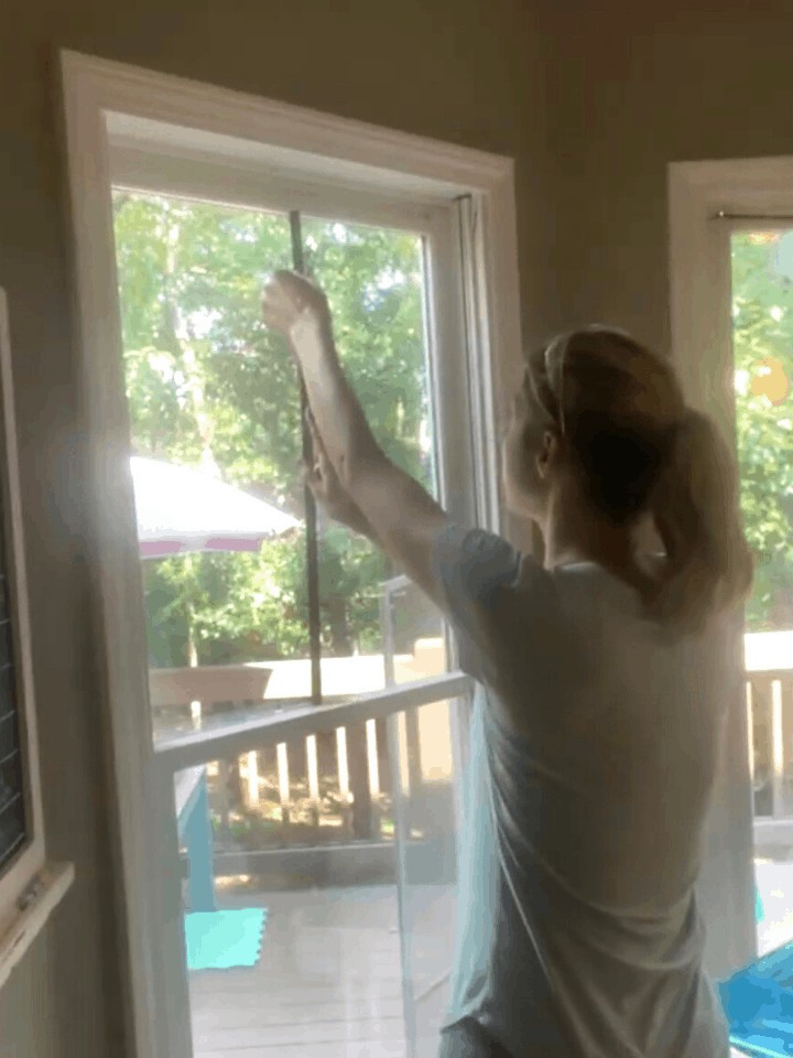 DIY Black Inset Windows trim painted in Cameo White by Benjamin Moore. Get the skinny on how I demo'd these windows, installed new trim, and added DIY Mullions!