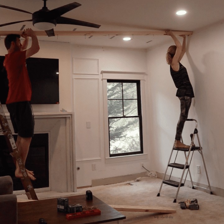 Coffered ceilings aren't as difficult to install as you'd think. Here's how to map them, build them, and finish them with custom trim. Total cost breakdown and timeline. #cofferedceiling #diycofferedceiling #livingroomrenovation